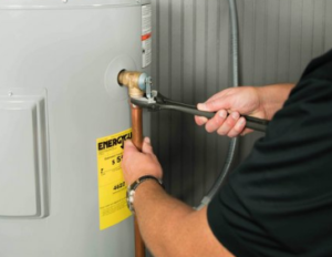 Reattach the discharge pipe to the new valve.